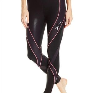 CW-X stability leggings. Pink/black size small.